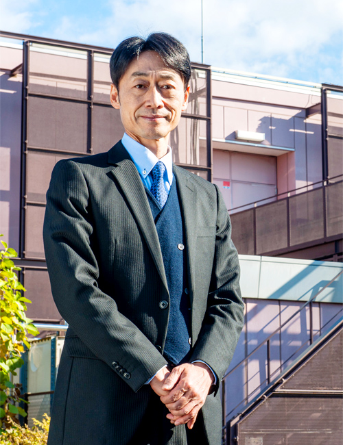 Takaaki Matsumoto outside the company office